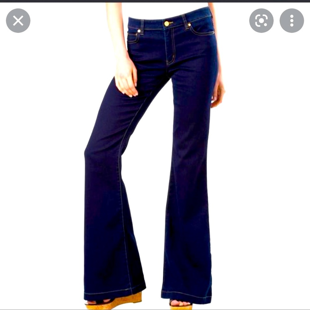 Michael kors bootcut and golden button size 8, waist is altered